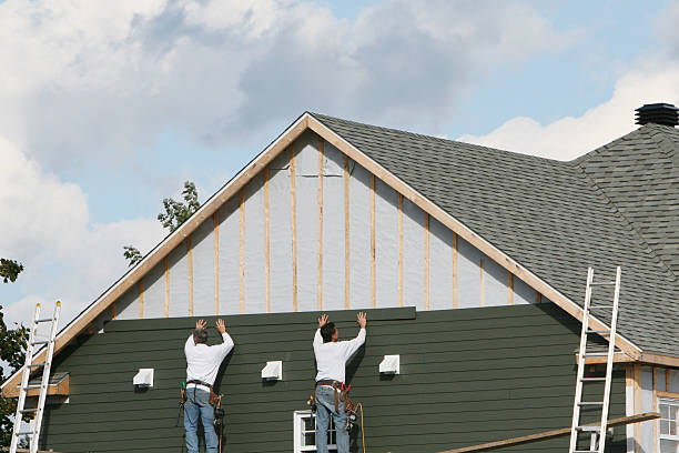 Professional Siding Contractor technician working in Conover, OH